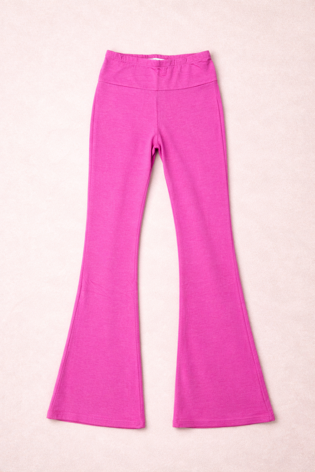 pink leggings on a pink background