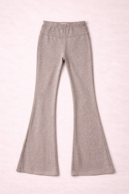 taupe leggings on a pink background