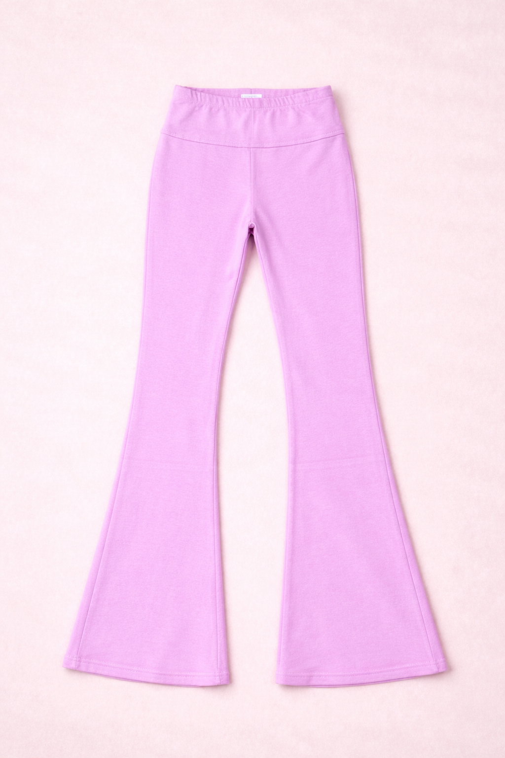 pink leggings on a pink background