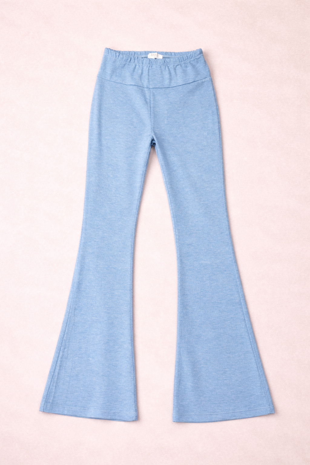 light blue leggings on a pink background